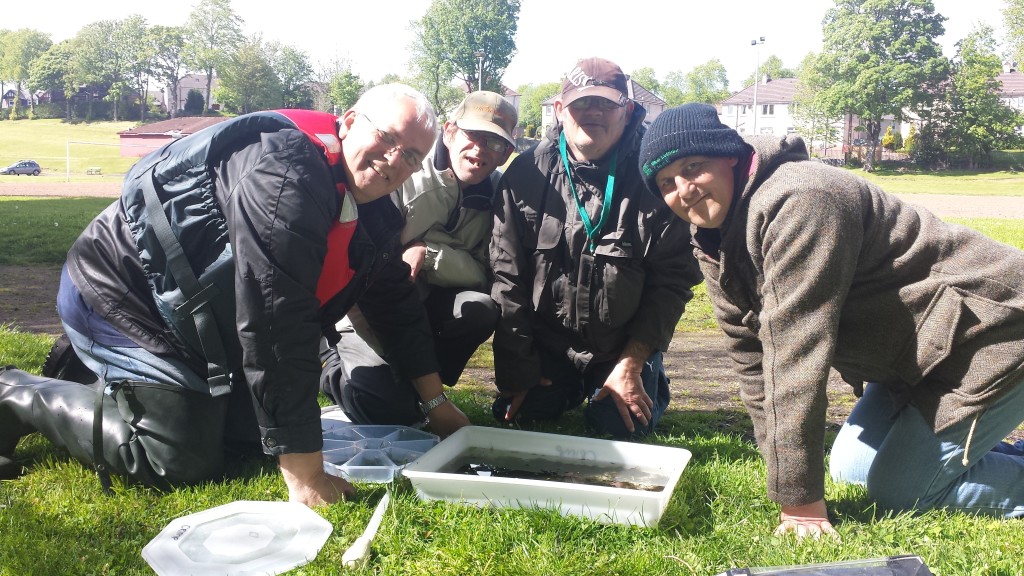 Keen anglers from Quarriers learning more about riverflies for the Clyde Riverfly Monitoring Partnership. The group is now actively involved in monitoring the health of the Tollcross Burn. 